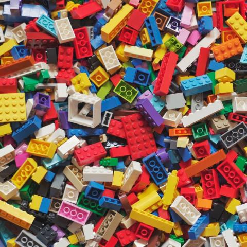 A scattering of several LEGO blocks.