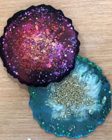 Coasters made from resin with varying colors and glitters and mica powder