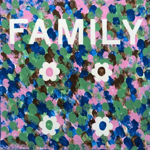 Fingerpainting that says family with pink, blue, green, and brown fingerprints all over the canvas. 