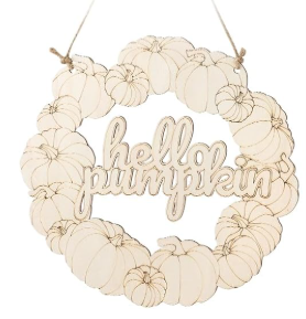 Wooden wreath made of pumpkins that says "hello pumpkin" across the middle.